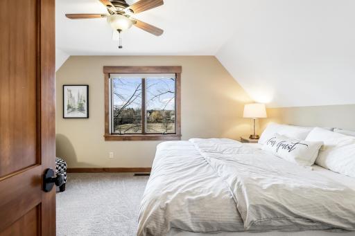 Bedroom 4: pitched ceilings, new carpet & large closet.