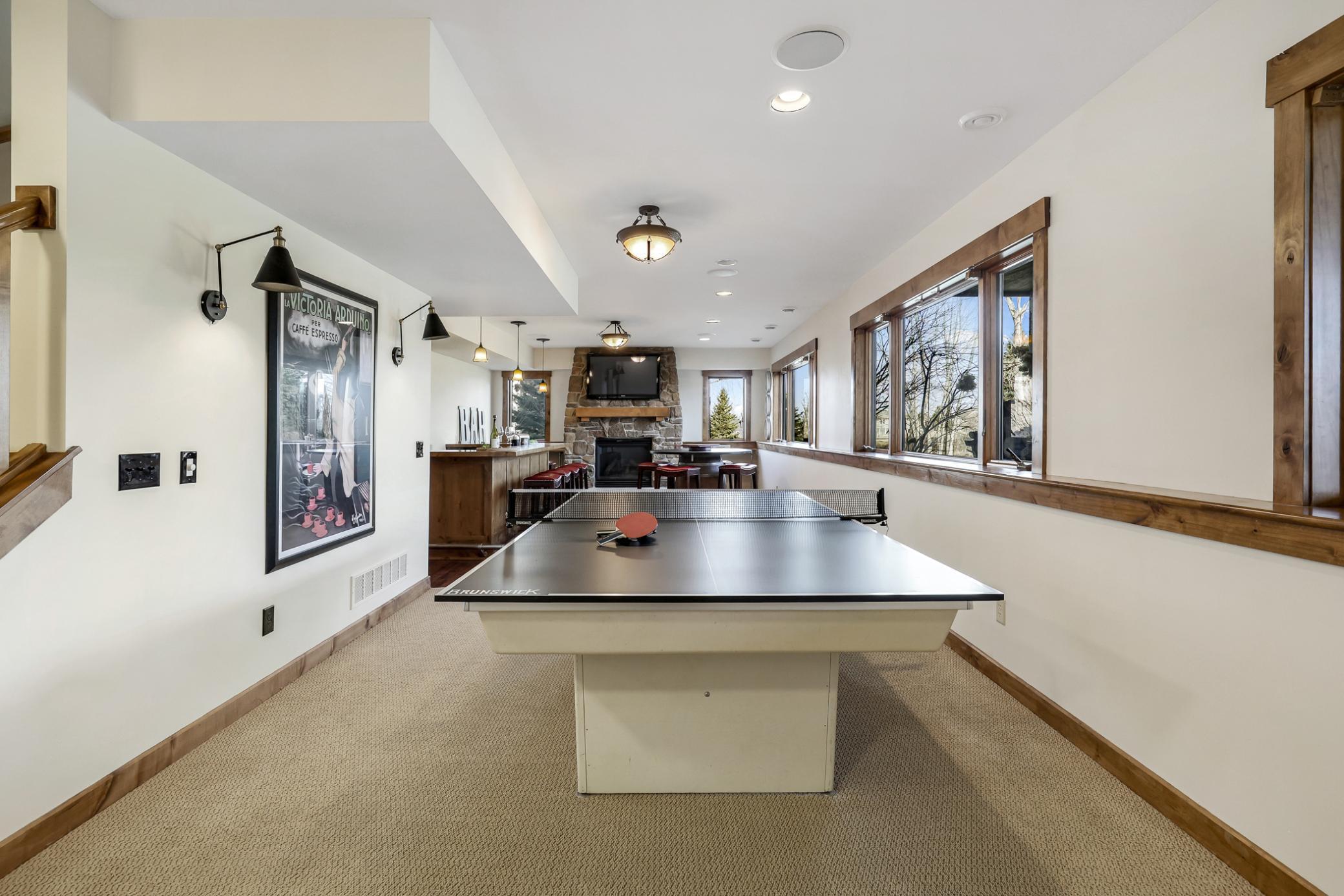 This level steps directly out to the relaxing backyard gathering areas, and features entertainment areas, private spaces, support areas, mechanicals, and @9’ ceiling.