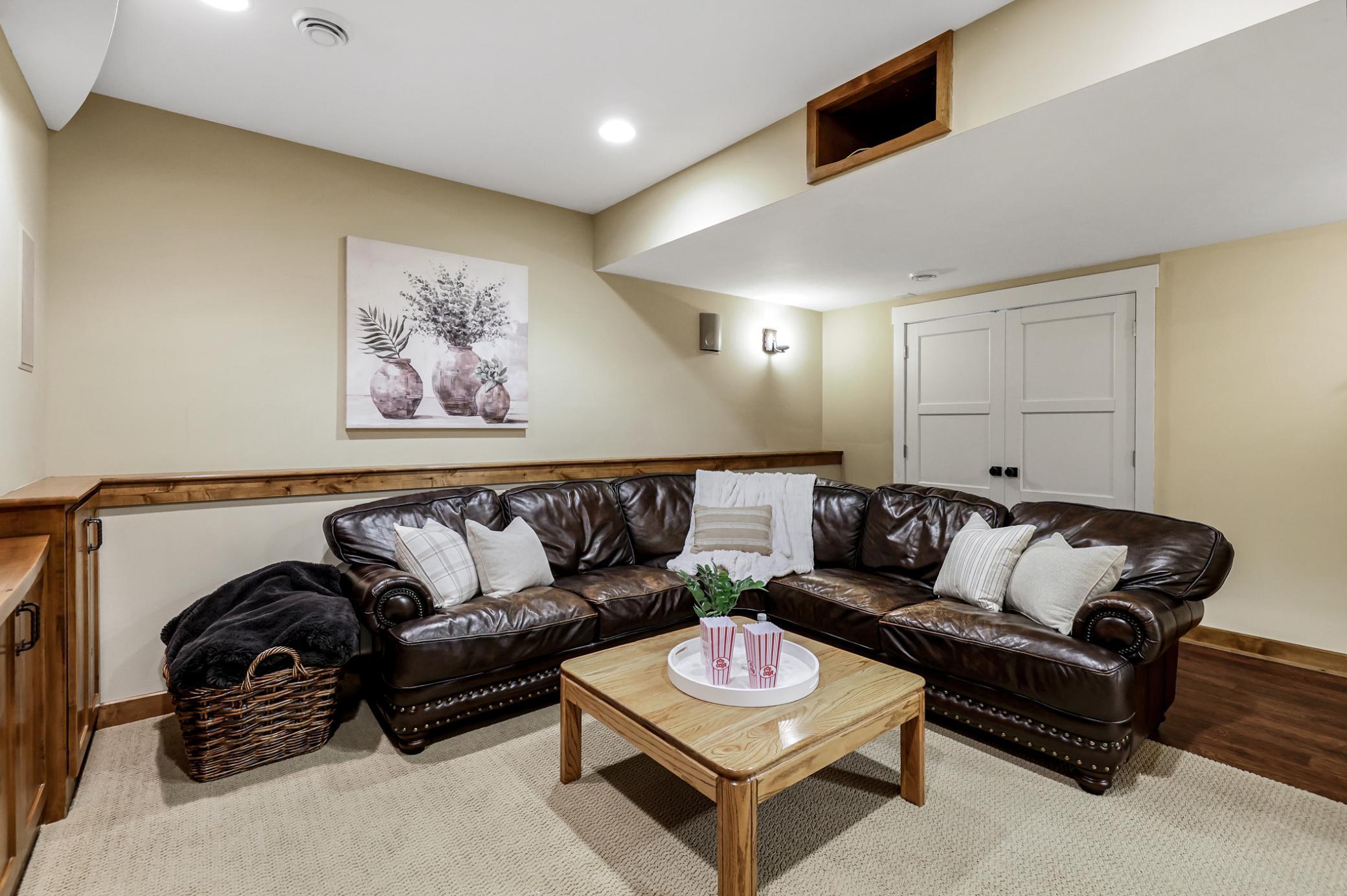 Dual entry: one door leads to the hallway + new French doors open to the bar & amusement room.