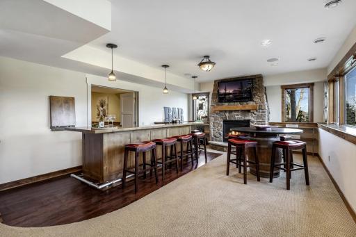 Excellent space for game tables and entertaining. Oversized windows all along one wall for natural light & views of the fabulous backyard.