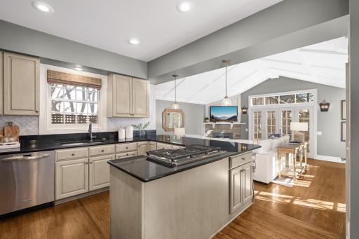 It is rare to find a family room open off the kitchen in Country Club.