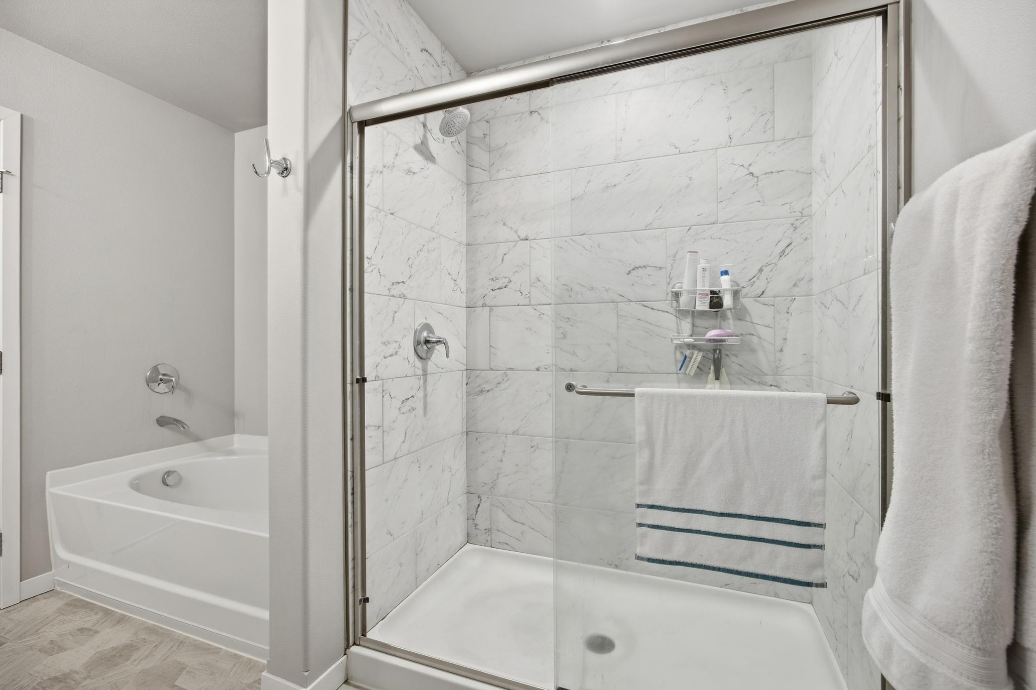 Primary Bathroom (Tile shower & Tub)
