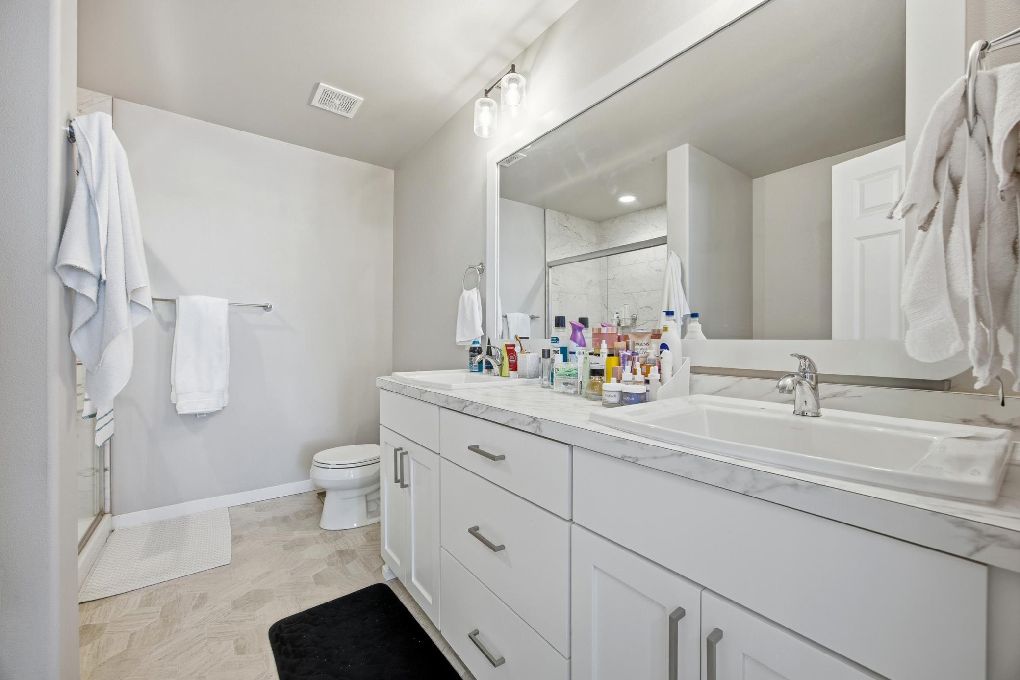 Primary Bathroom (dual sinks)