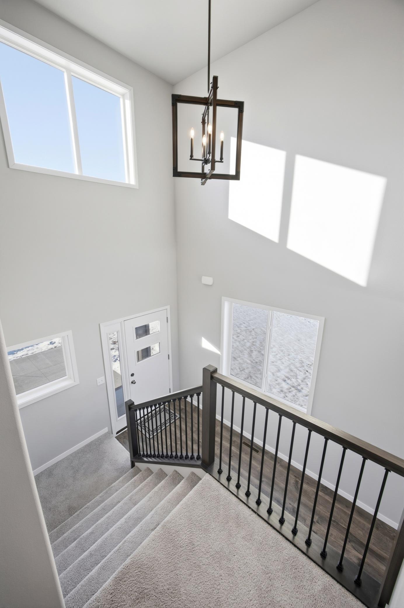 Beautiful Stairway and Double Vault Entry
