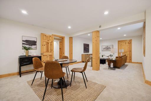 Spacious basement recreation room, with tall ceilings. Great place to have a game night and watch a game