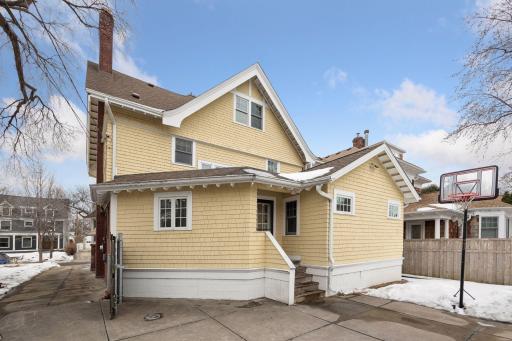 Fully fenced back yard with a 3 car garage