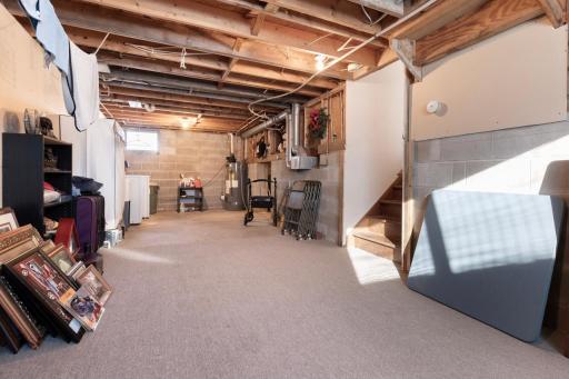 Great unfinished basement waiting for your final touches!! Updates include new vinyl siding, new roof, and new A/C