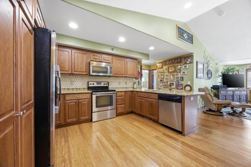 Kitchen with Granite Counters & Tile Backsplash