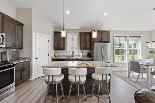 The kitchen is open and spacious, with ample room for both cooking and gathering