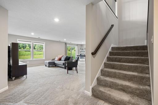 Retreat to the wide open lower level with walkout access to the backyard