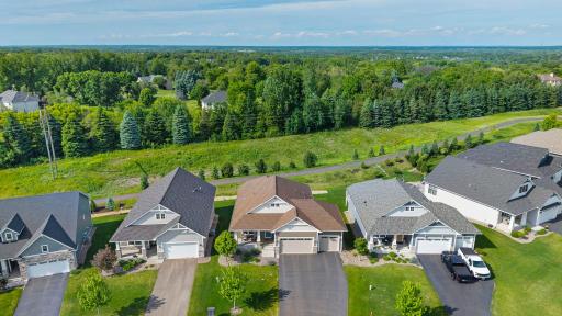 Enjoy a fantastic lot with no neighbors behind you—just step outside and hop on the walking and biking trail for an afternoon adventure