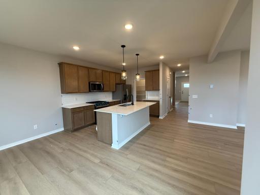 Cafe towards kitchen and Front Entry/Flex Room