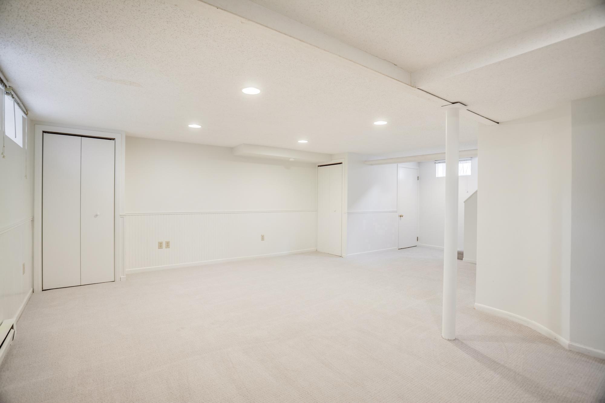 On the lower level, you 'll find a spacious family room, 1/4 bath, laundry and storage