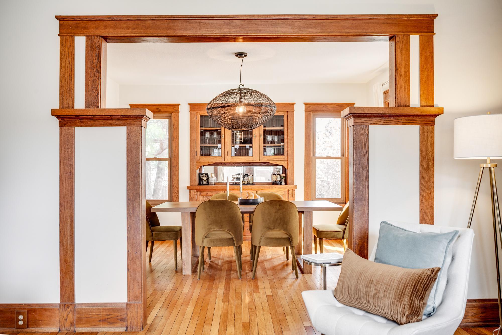 Formal dining room with original woodwork and built-ins