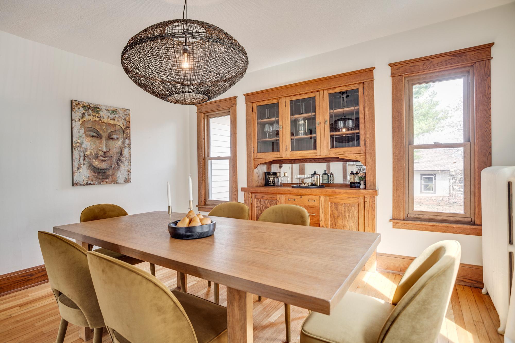 Formal dining room with original woodwork and built-ins
