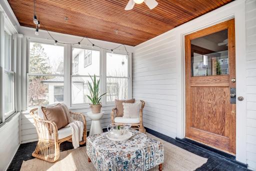 Enjoy morning coffee on the welcoming front porch overlooking Fairmount Avenue