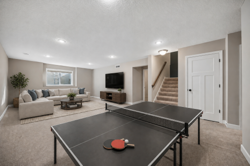 Lower level Family Room, virtually staged
