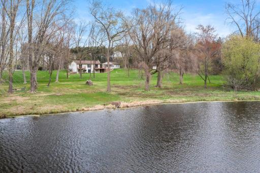 Enjoy water access on the shared pond behind the home