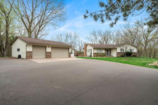Spacious inside and out, this home features a heated detached garage with additional workspace and a sunroom