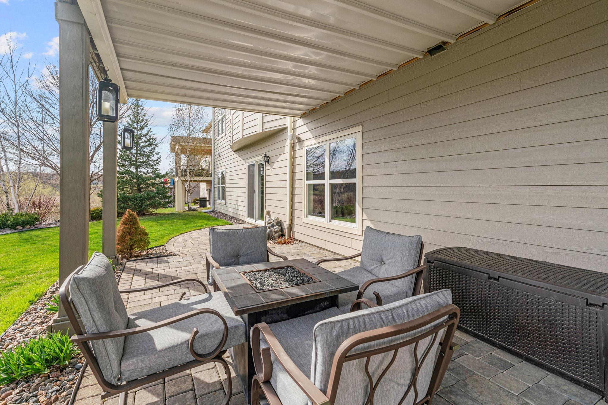 Walk out to Paver Patio with under-decking (for rain protection) overlooking wetland views.