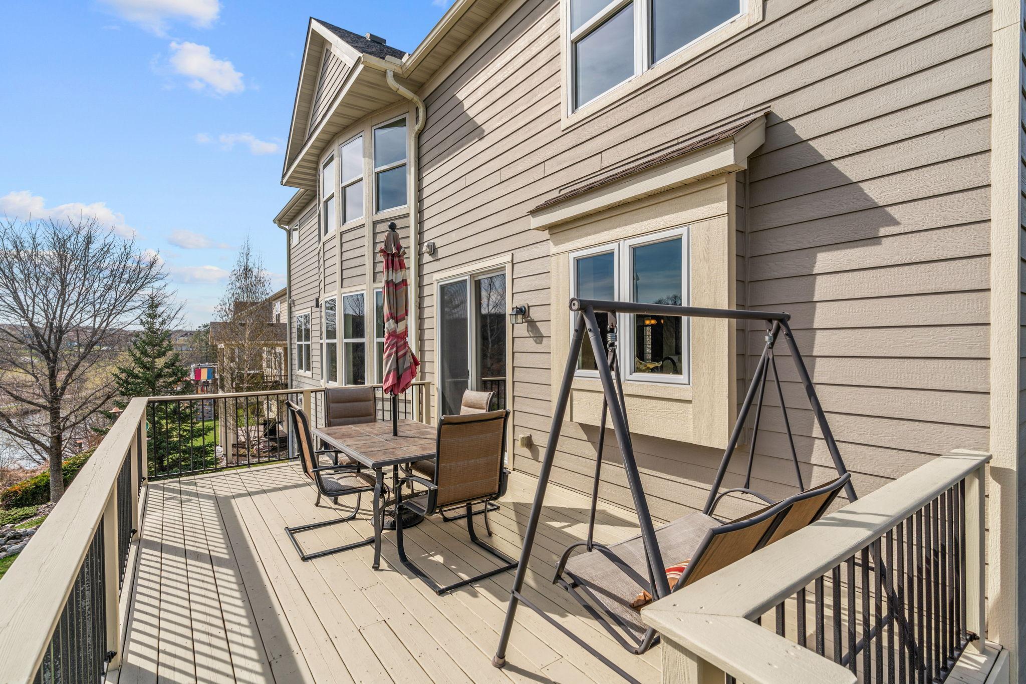 Overlooks private backyard with stunning wetland views & direct access to the Greenway