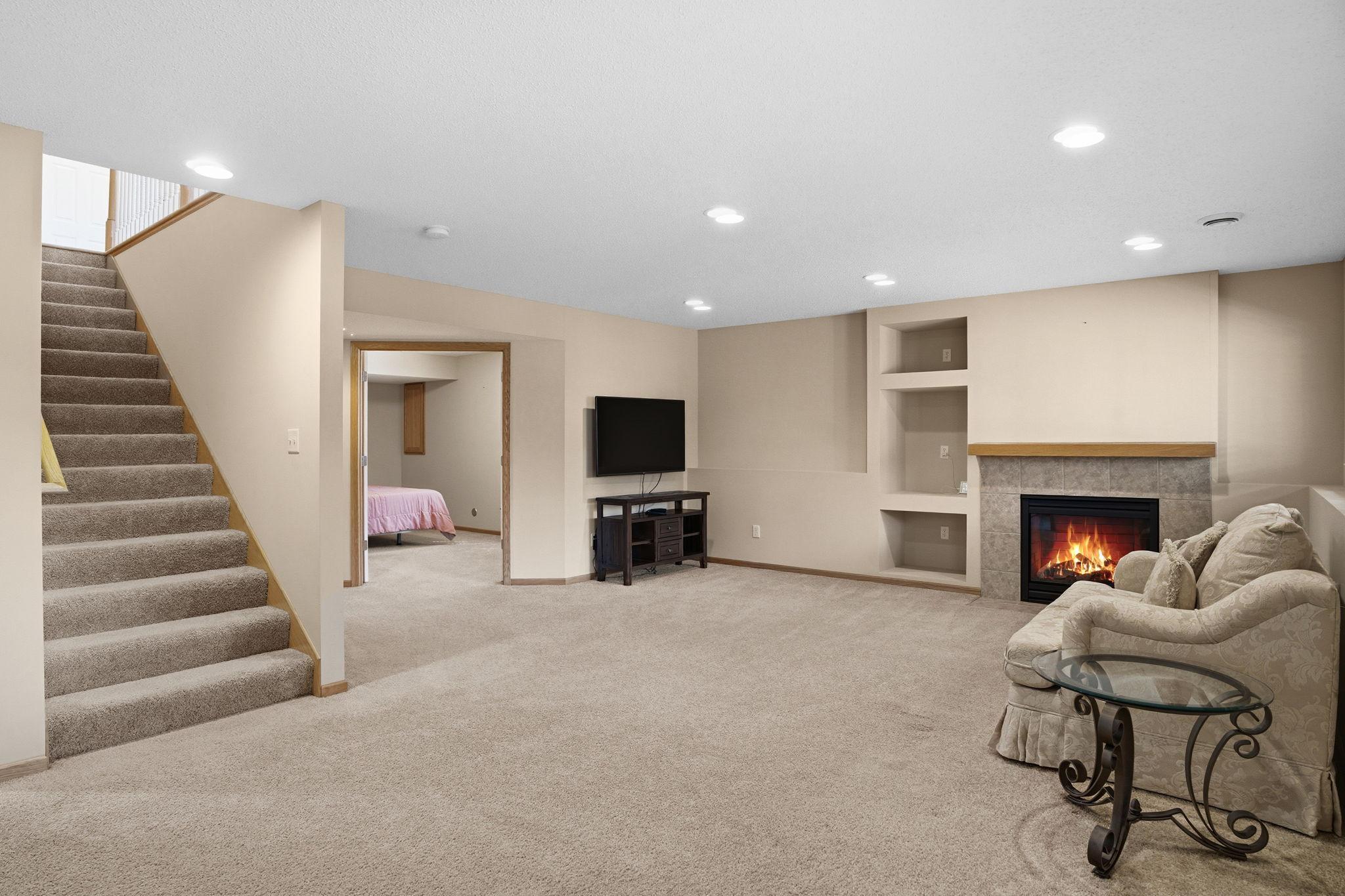 Lower Level Family Room w/ Gas Fireplace