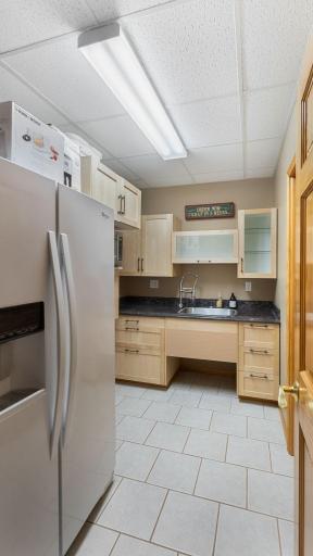 Lower level kitchenette for entertain, guests or multigenerational living.