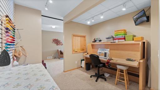 Bonus room being used as a workshop/office.