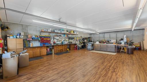 Finished space, great for many hobbies or an overflow entertaining space. Infloor heat from the home is extended into this area and the elevator is access from this space as well. 28 x42 space