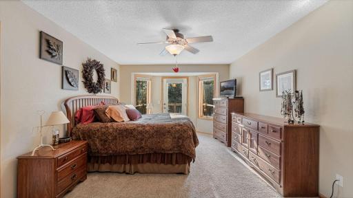 Primary bedroom lends access to the deck.
