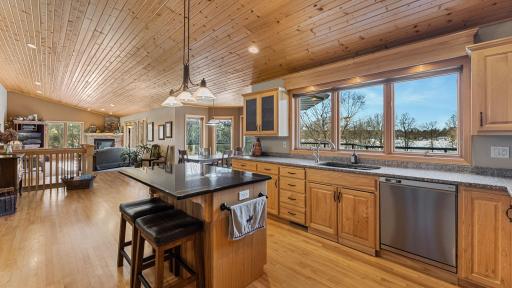 Vaulted ceilings create an elevated space with each independent space merging to the next.
