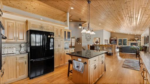 Timeless selection of cabinet style and stain color will having you love this design. Accents of glass, bronze brushed handles and fixtures compliment perfectly.