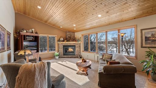 Well lit and inviting living area invites you to cozy up and enjoy the view.
