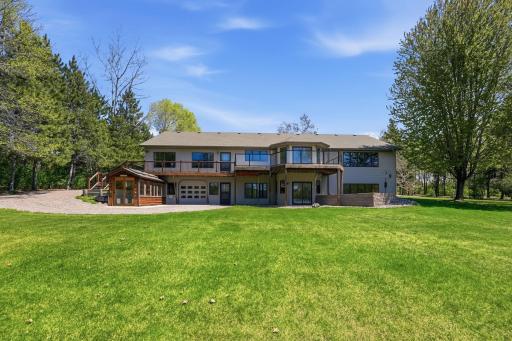 Back of home positioned to take advantage of stunning lake and waterfront views.