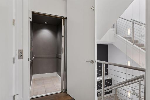 Personal and private elevators services all floors of the home.