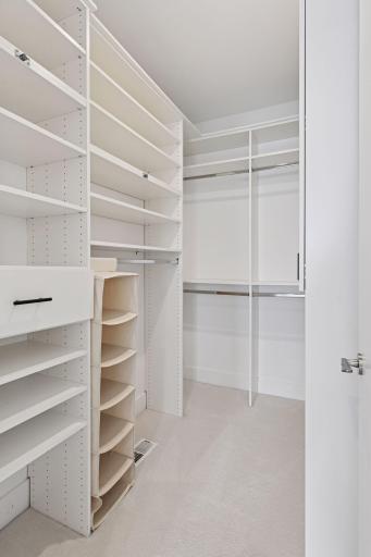 Dual walk-in closets with automated lights
