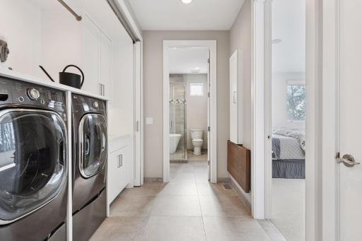...and concealed full-size washer and dryer.