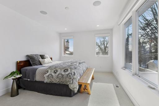Bedroom 3 on the upper level has two walk-in closets
