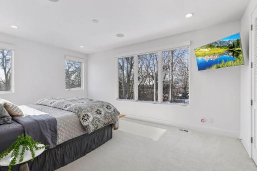 ...windows on two sides overlook backyard. (TV will stay with home)