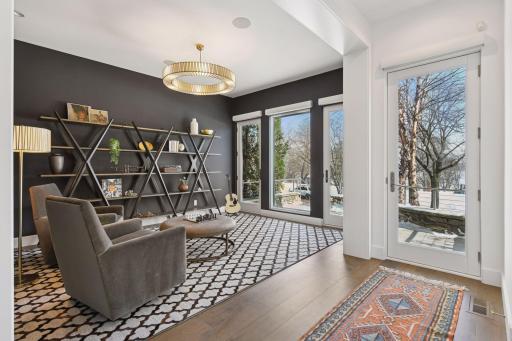 Tall floor to ceiling windows provide views of morning sunrises