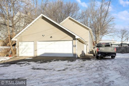Huge 3 car garage with additional driveway parking.jpeg