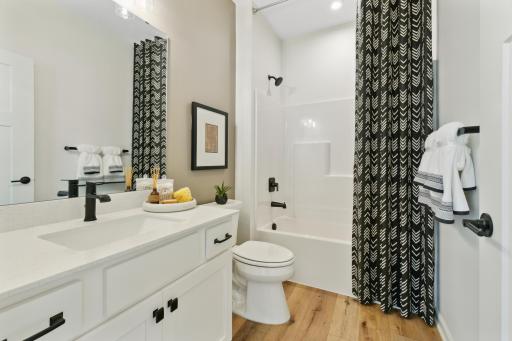 Pictures from previously built model to showcase space and layout. See list agent for option/color specifics.
