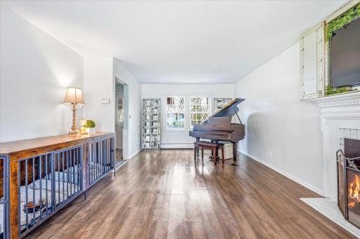 Plenty of space for your baby grand piano in the back nook. Or makes for a great sitting area