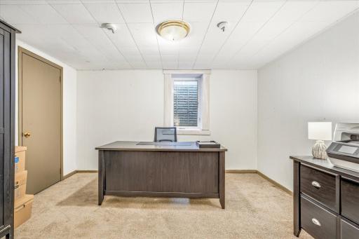 Back area makes for great office area or maybe foosball or pool table?
