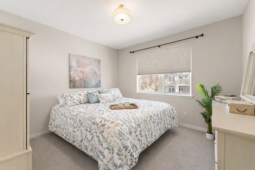 Serene bedroom with botanical-themed decor.png