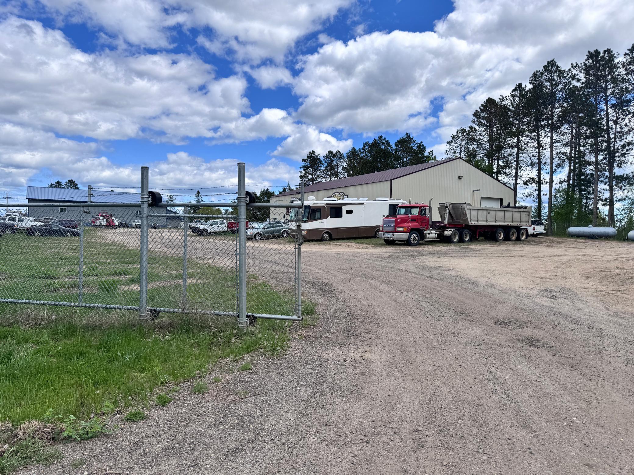 Wittner Auto Body in a secured gated yard