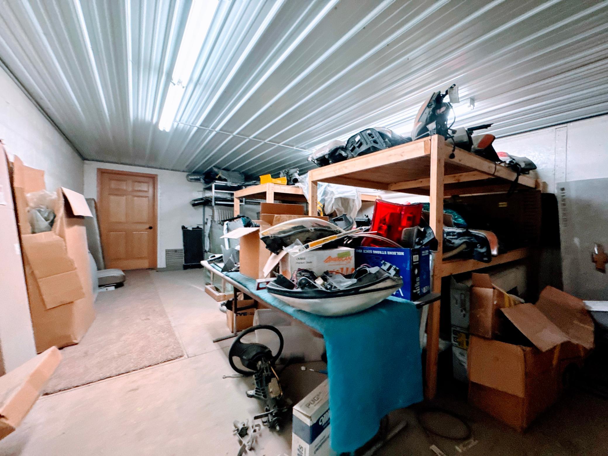 Upstairs storage space, this door leads to the bonus upstairs office