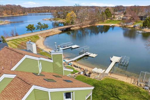 Aerial overview of shoreline, dock placement, and surrounding properties.