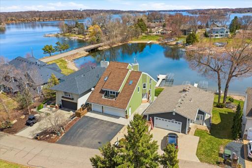 Aerial view showcasing proximity to the lake and surrounding neighborhood.