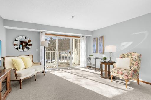 Natural sunlight pours through the south facing slider doors